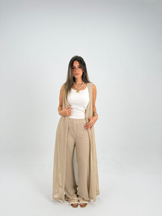 Hooded crochet long vest in beige With knitted pants 