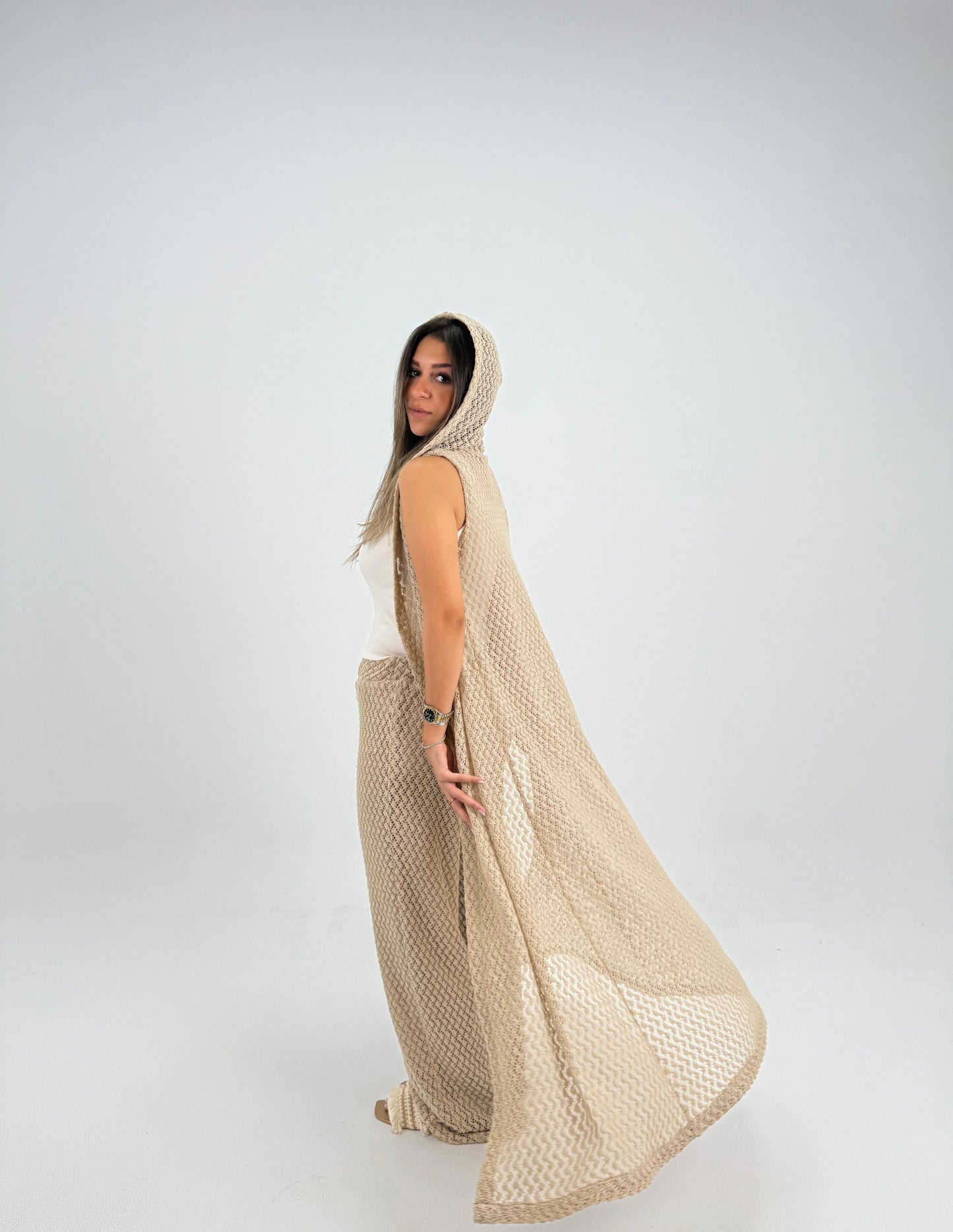 Hooded crochet long vest in beige With knitted pants 