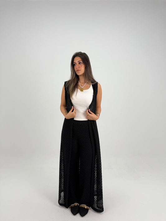 Hooded crochet long vest in black With knitted pants 