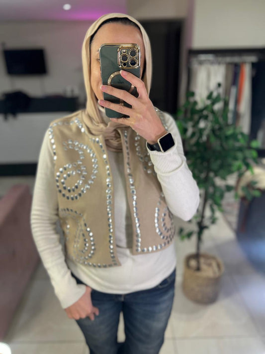 Beige suede vest with studs